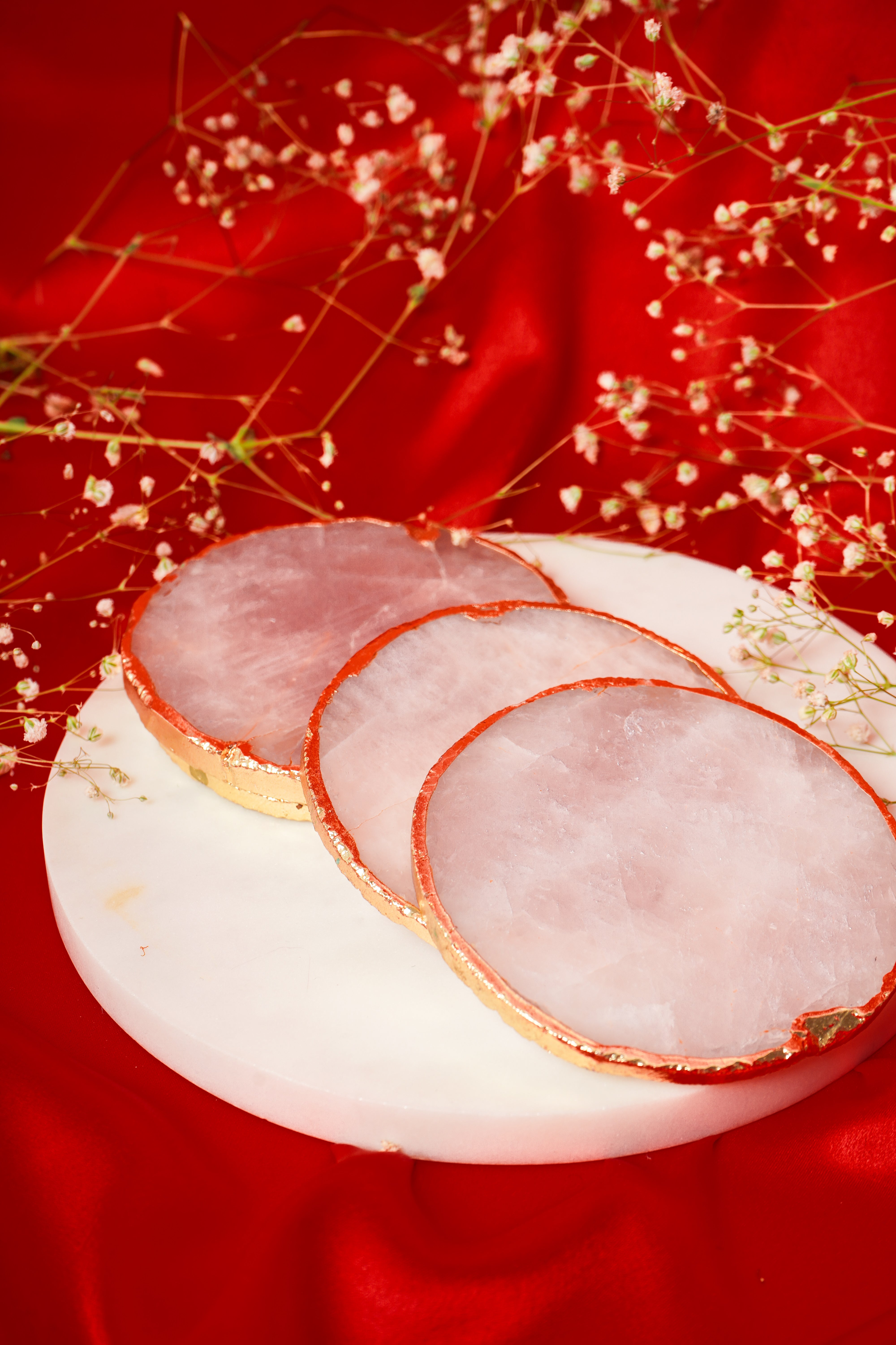 Set of natural rose quartz coasters from My Store, showcasing smooth, pink gemstone coasters in a set of 2, 4, 6, or 8.
