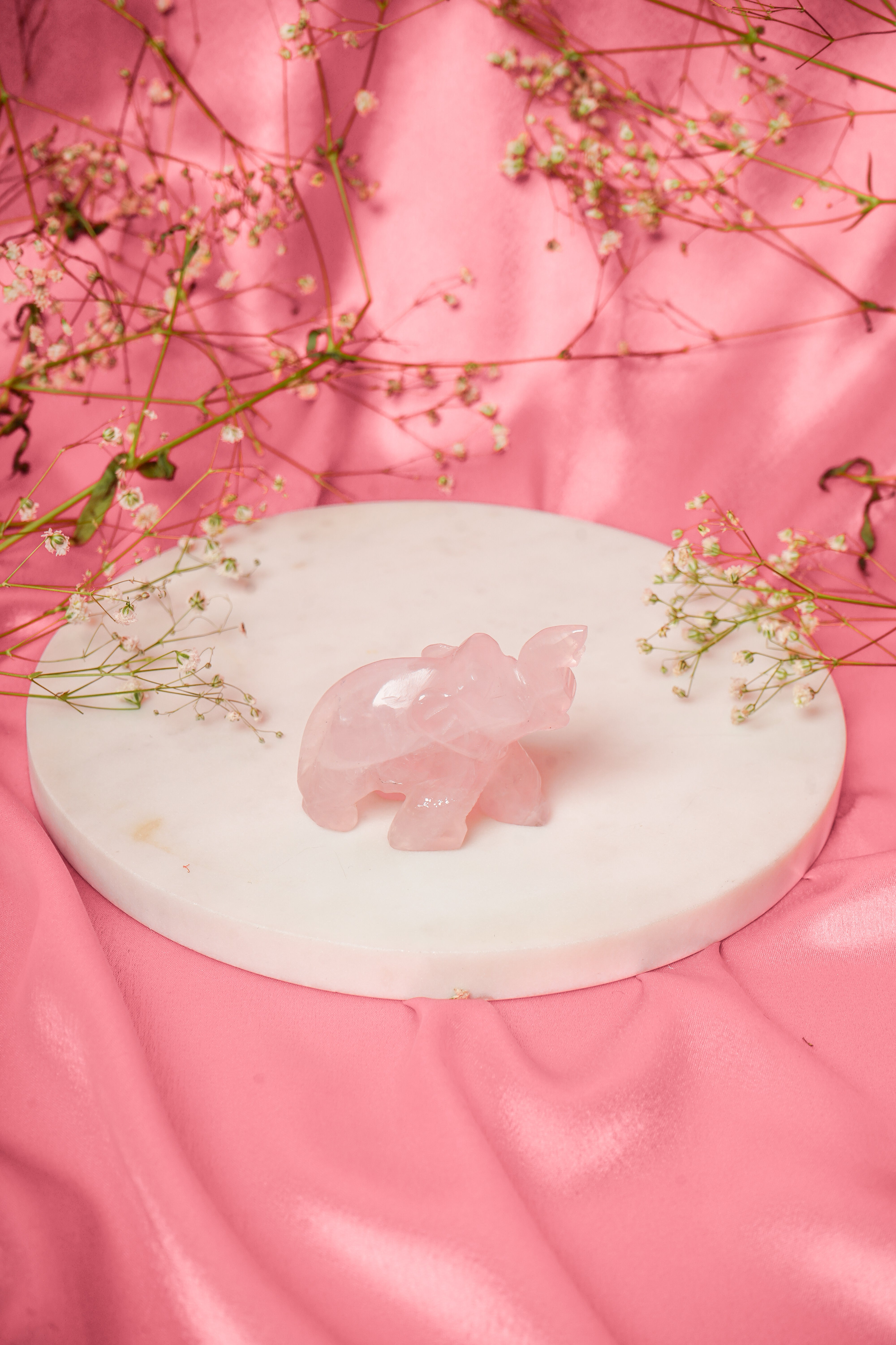 Natural rose quartz elephant figurine with smooth, polished surface and gentle pink hue, crafted by My Store.