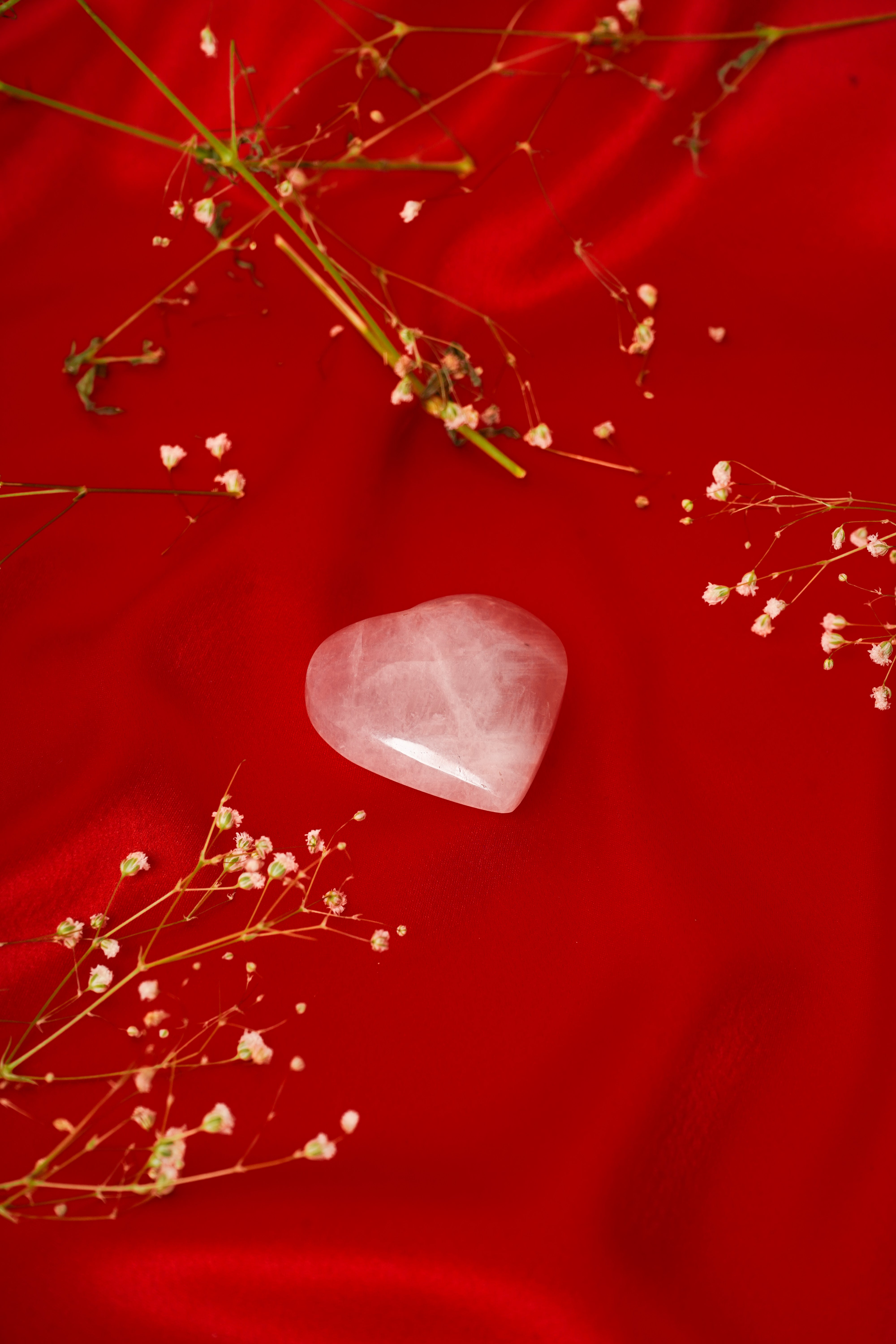 Natural rose quartz heart crystal from My Store, showcasing a smooth pink stone with gentle natural patterns and a polished finish.