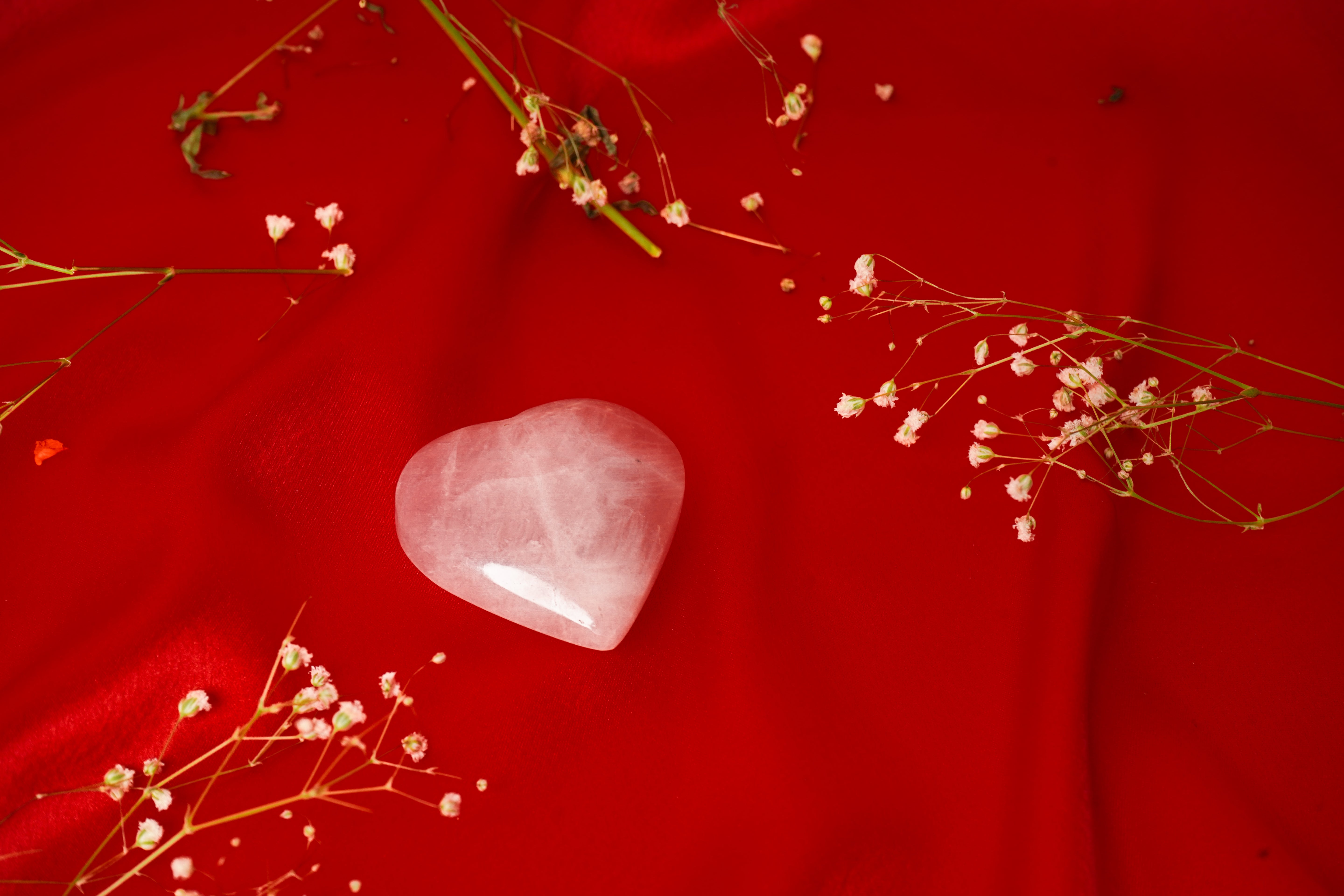 Natural rose quartz heart gemstone from My Store, showcasing its pink, polished surface and smooth, heart-shaped form.