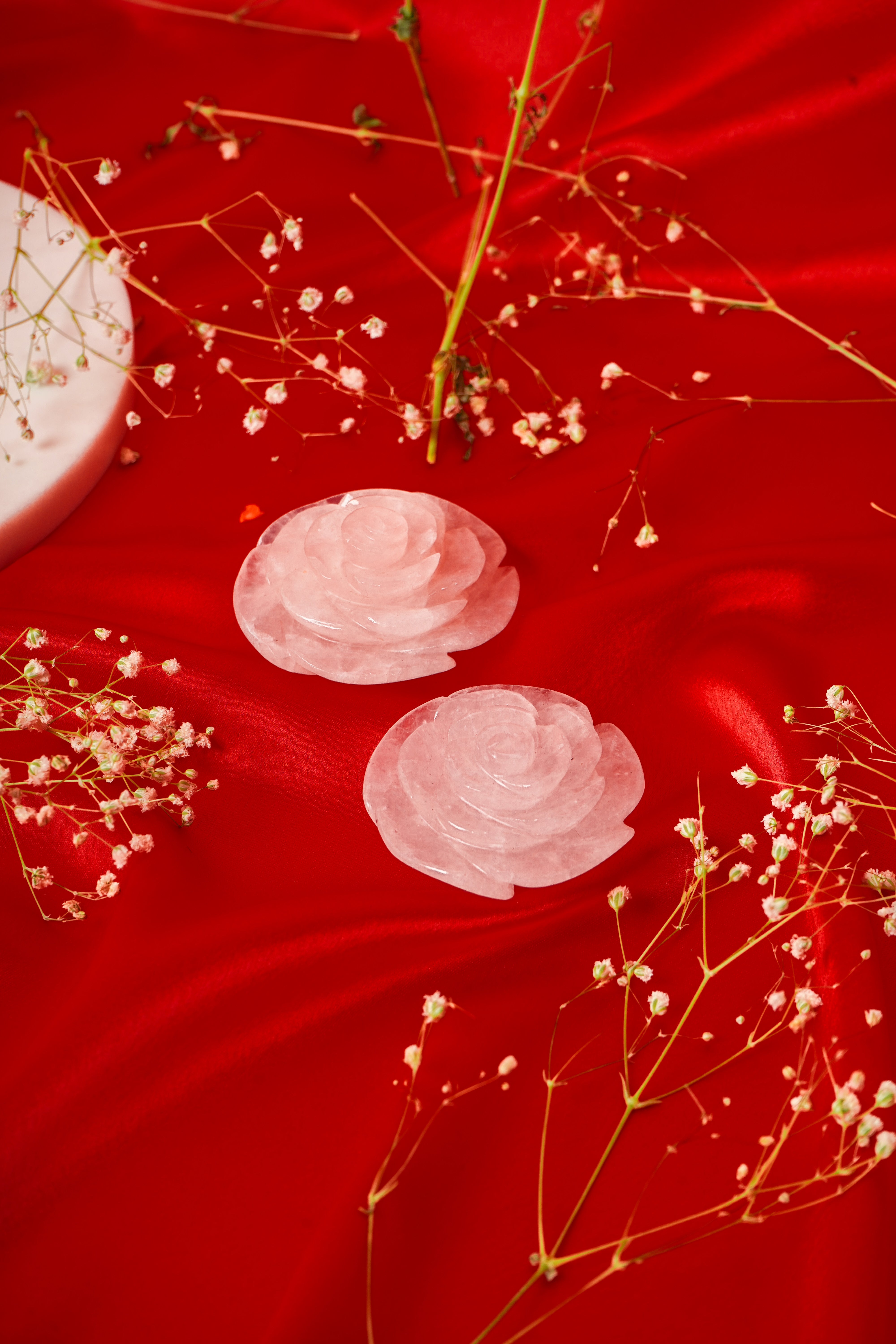 Pair of natural rose quartz rose flower crystals, showcasing soft pink hues and intricate petal details, from My Store.