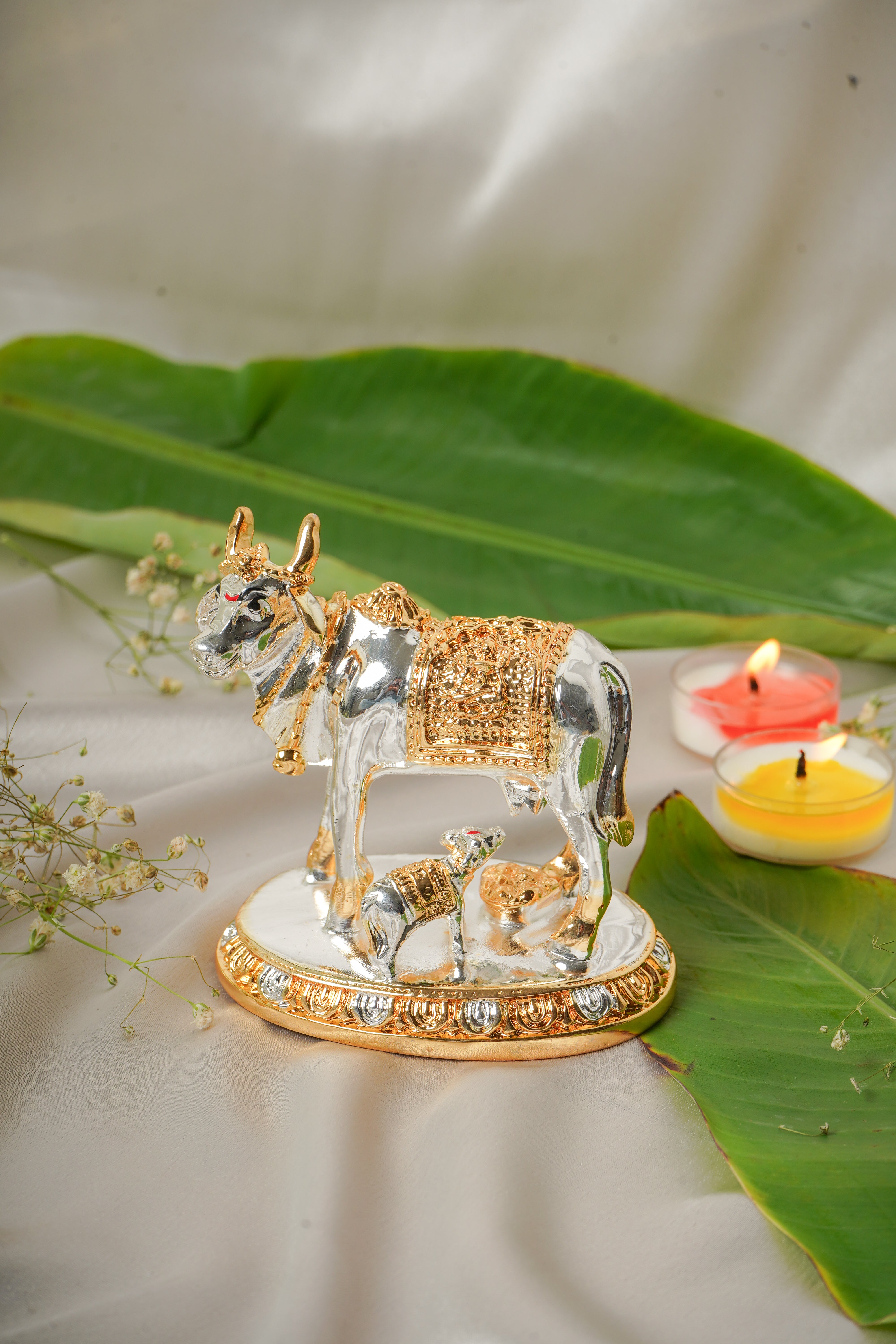 Silver and gold plated cow figurine, detailed craftsmanship, decorative animal sculpture from My Store.