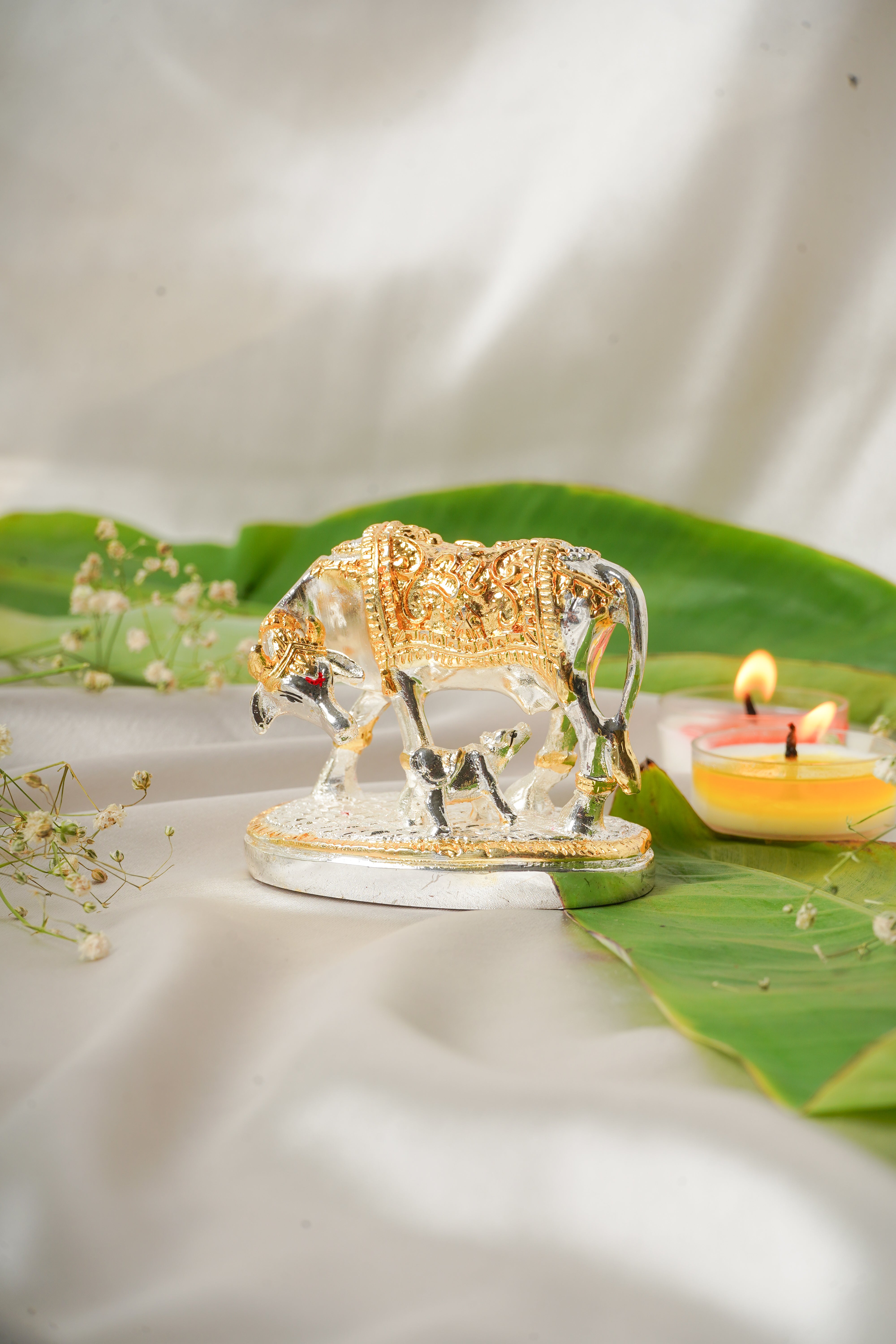 Silver and gold plated cow figurine with detailed features, crafted by My Store, showcasing a shiny, realistic animal sculpture.