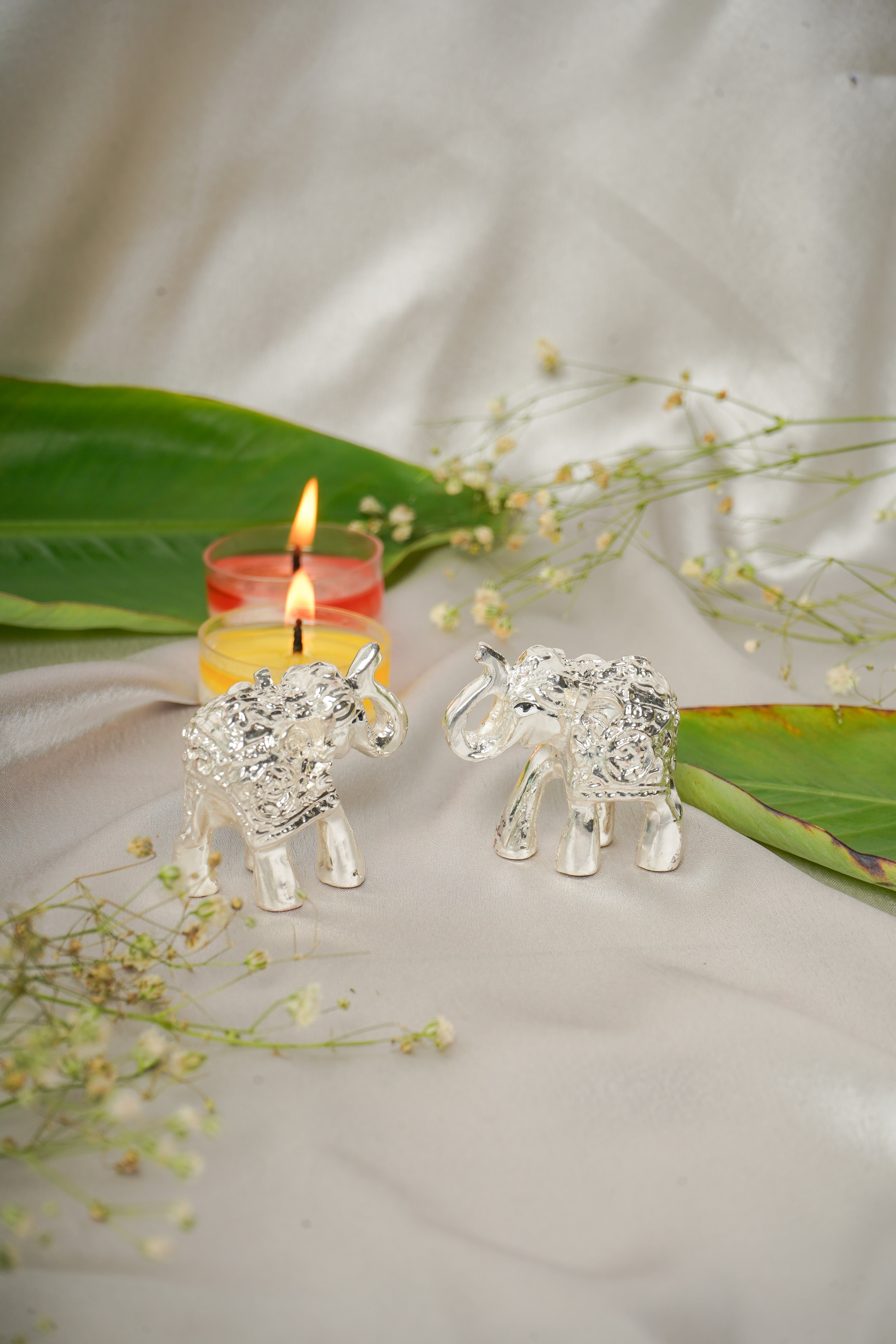 Silver plated elephant pair figurines, detailed decorative animal sculptures, crafted with intricate design from My Store.