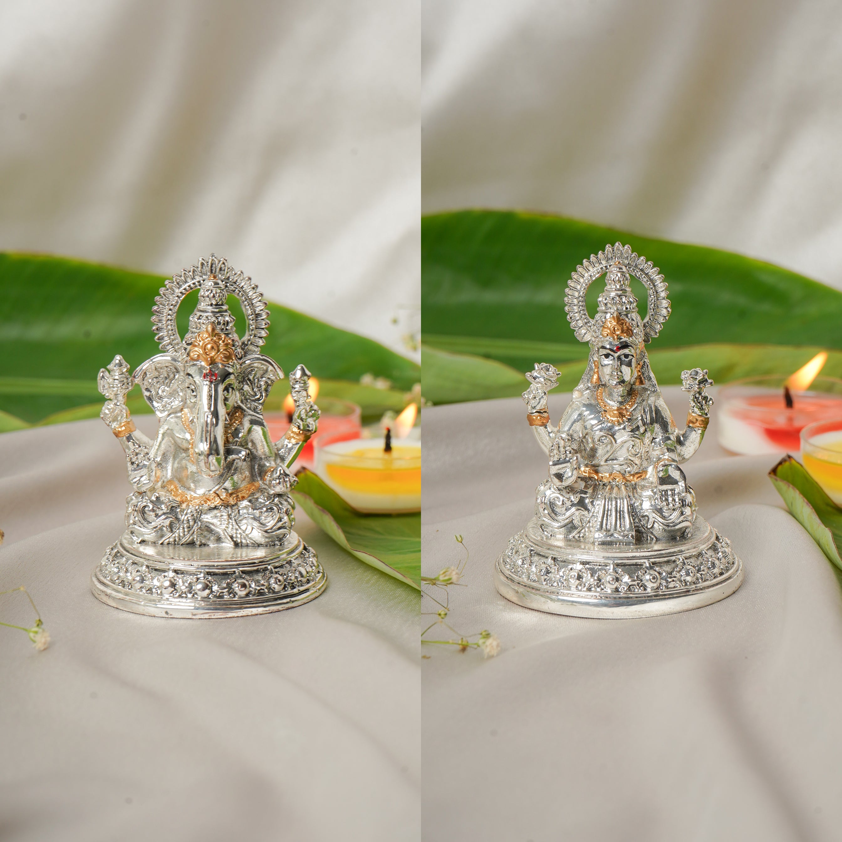 Silver and gold plated Lakshmi and Ganesh Ji figurine, intricately detailed Hindu deity sculpture.